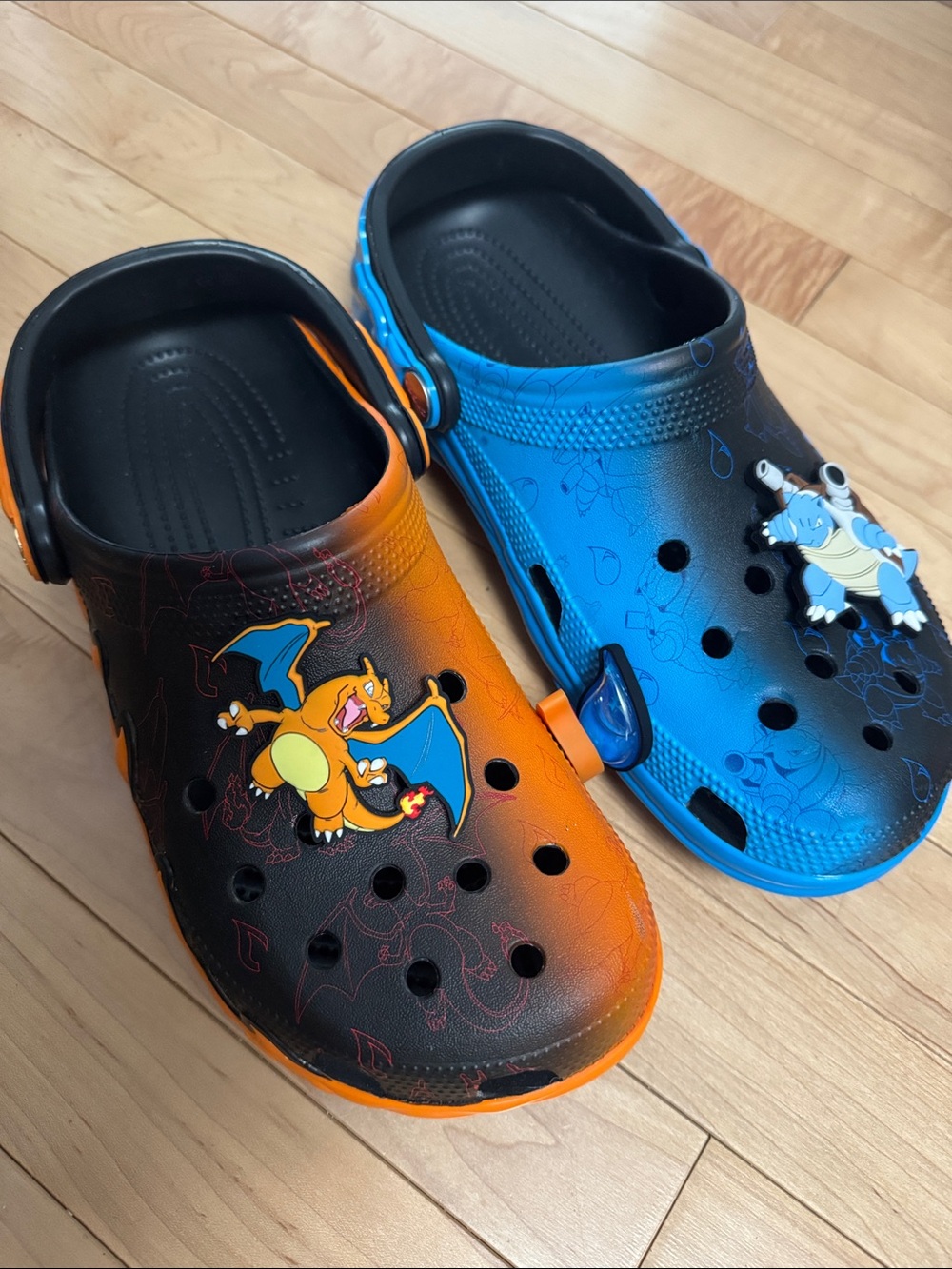 CROCS mens size 10 Two-Tone Charizard and Blastoise Clogs in Orange and Blue